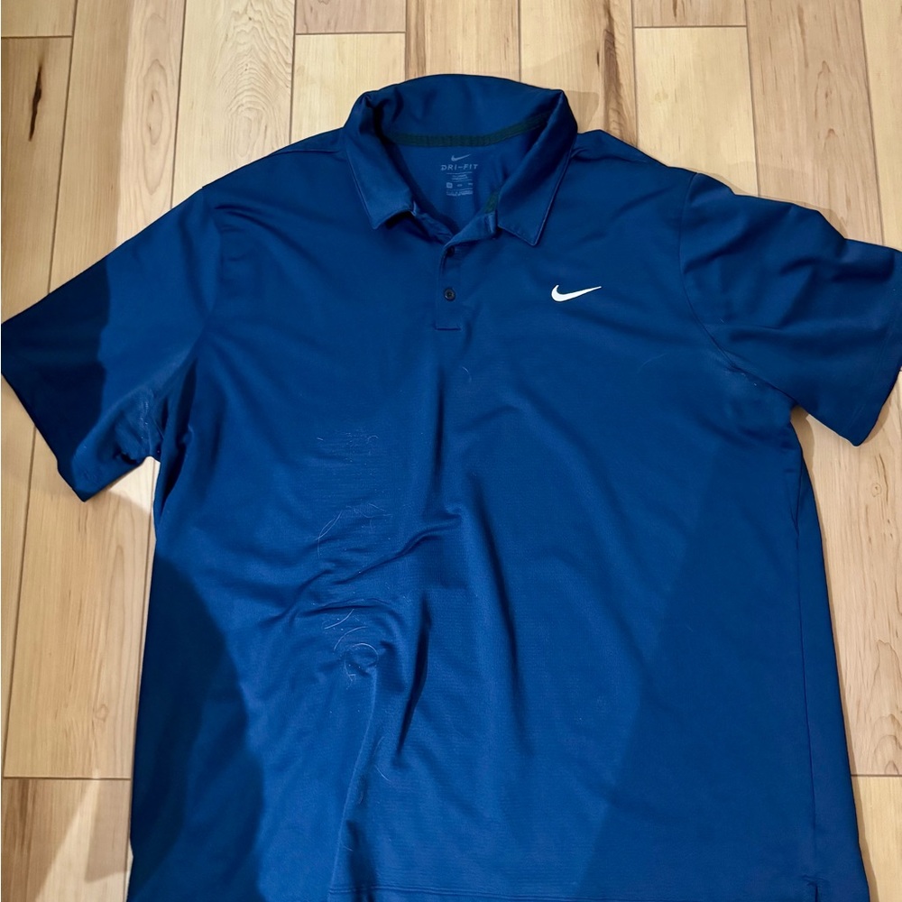 Nike Blue Polo Shirt with Classic Collar and Lightweight Fabric